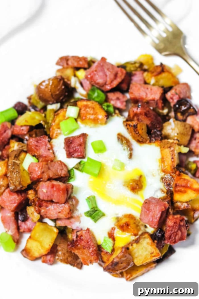 Crispy Air Fryer Corned Beef Hash 8 Close-up of air fryer corned beef hash cooking