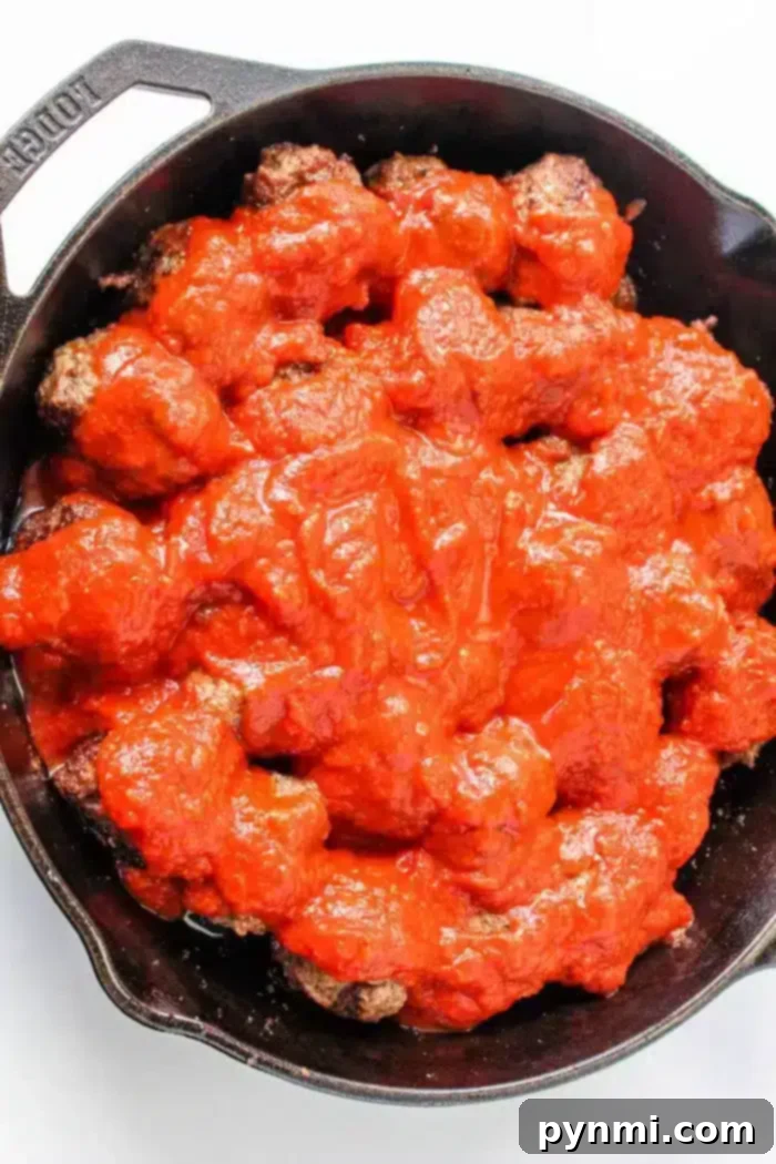 Whip Up Perfect Stovetop Meatballs 2 Learn how to cook meatballs on the stovetop with a cast iron skillet, where juicy meatballs are beautifully covered in a bright red tomato sauce.