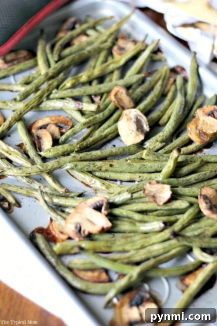 Perfecting Frozen Green Beans 3 Sheet pan green beans and sliced mushrooms roasted to perfection.