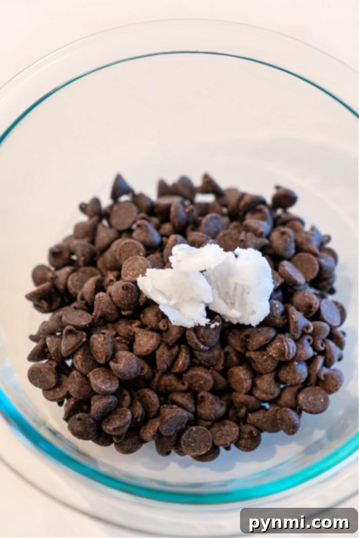 Chocolate Melt Microwave - A bowl of partially melted chocolate in the microwave