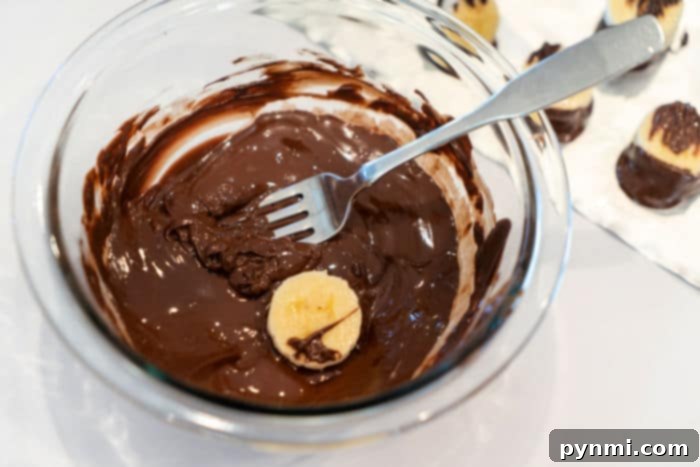 melted chocolate - Smooth, melted chocolate in a bowl, ready for use