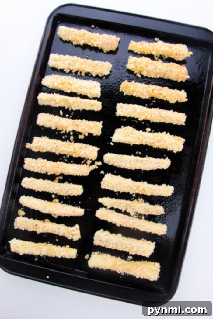 Golden Crispy Air Fryer Eggplant 5 Baked Eggplant Fries, golden and perfectly crispy, ready to be enjoyed as a healthy snack or side dish.