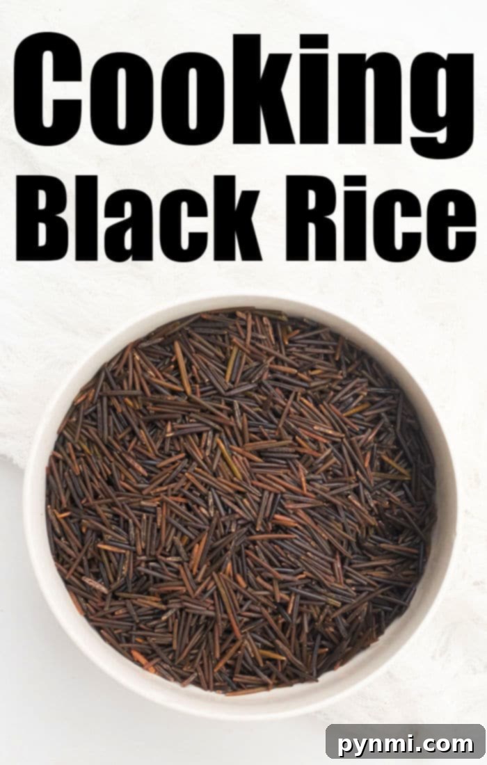 Instant Pot Black Rice Made Easy 3 A bowl of uncooked black rice with the text 'Cooking Black Rice in an Instant Pot' above it, highlighting the raw grain's rich color.