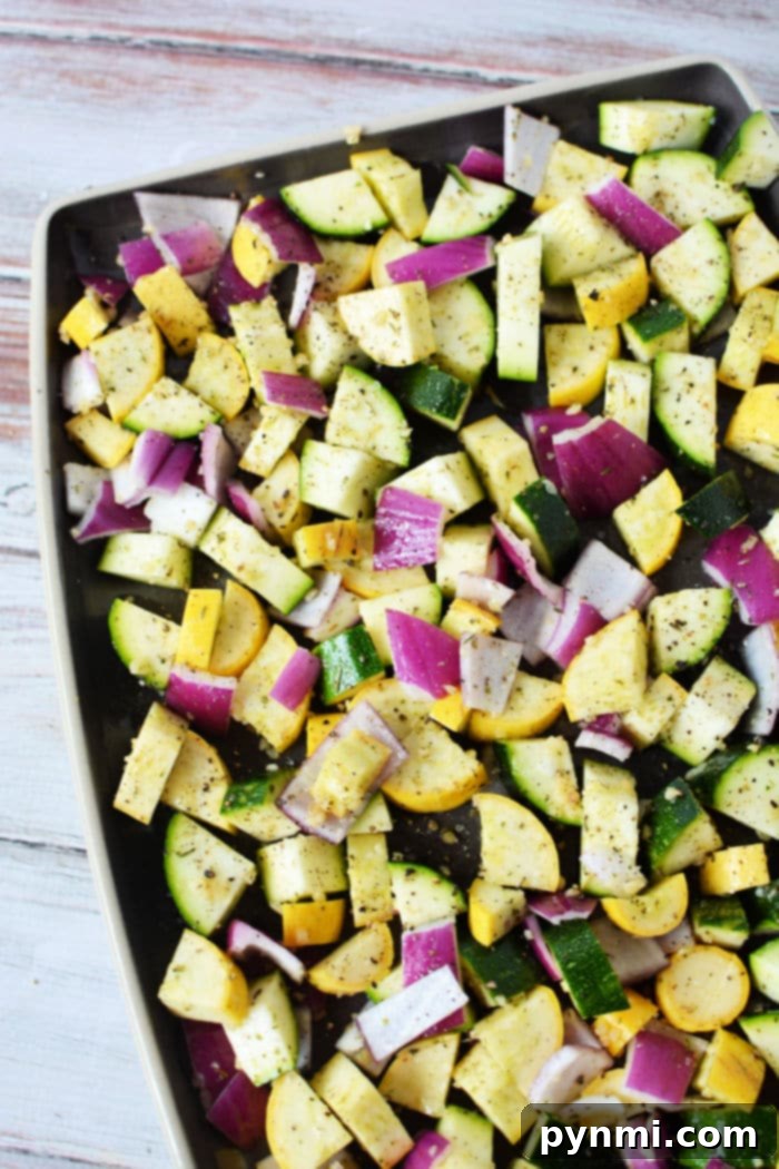 Golden Roasted Zucchini and Squash 4 Close-up of golden brown roasted zucchini and squash.