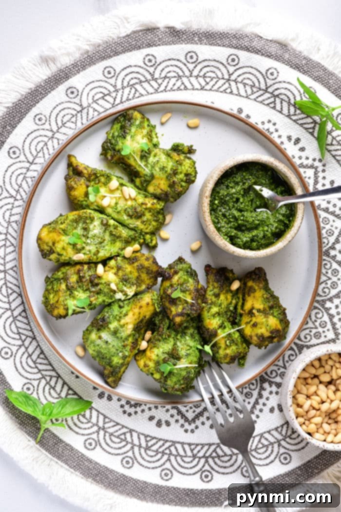 Crispy Air-Fried Pesto Chicken 7 Pesto chicken cooked to golden perfection with fresh herbs.