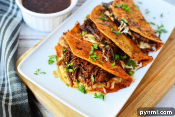 Instant Pot Chicken Birria Tacos, a lighter alternative with all the classic birria flavor.