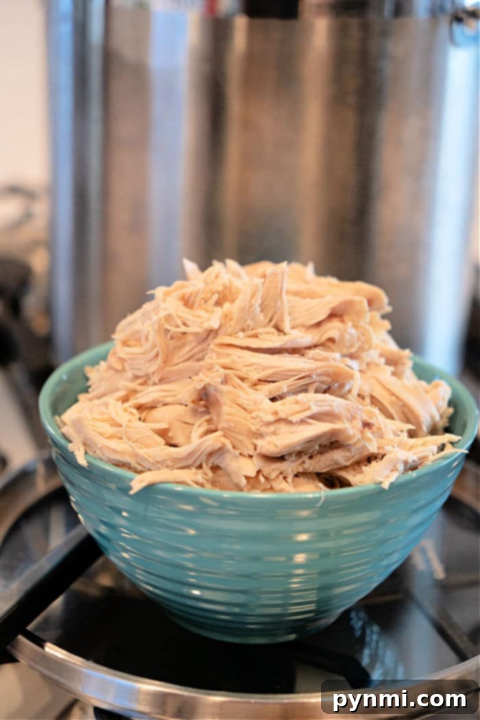 Achieving Tender Whole Chicken: The Ideal Boiling Time 9 How to Boil Whole Chicken on Stove - ready for shredding.