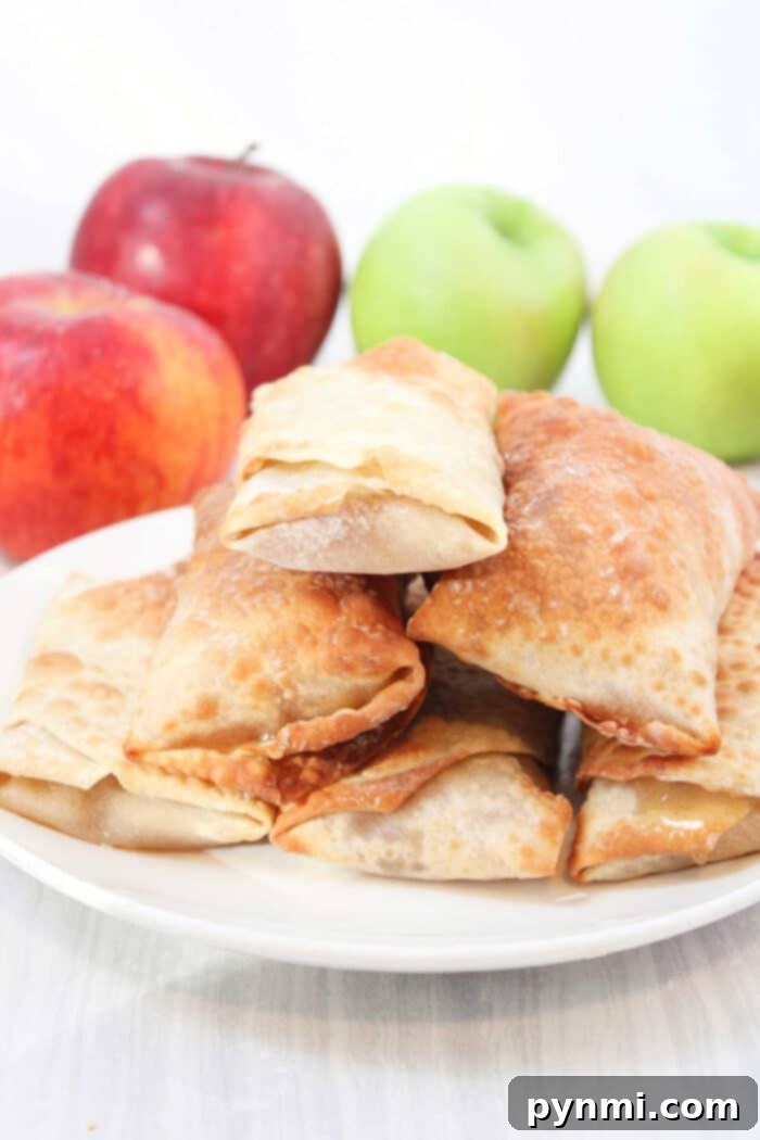 Apple Egg Rolls, presented beautifully for a tempting dessert or snack.