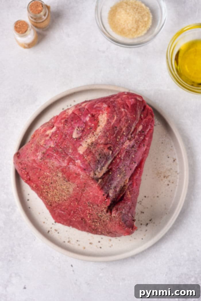 The Ultimate Melt-in-Your-Mouth Roast Beef 3 How to Make a Tender Roast Beef in the Oven - Sliced medium-rare roast beef, ready to serve.