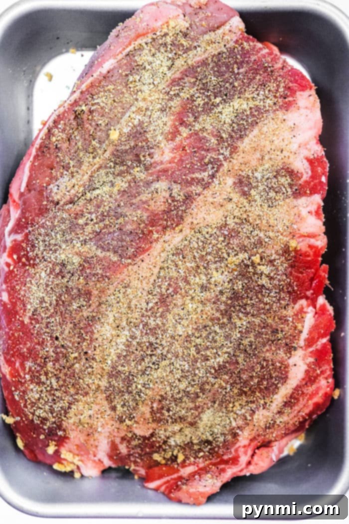 Texas Style Smoked Chuck 3 Chuck roast seasoned with a homemade dry rub, ready for the smoker