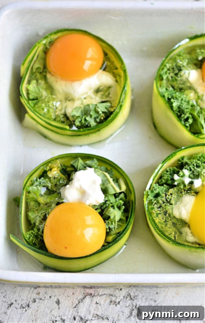 Sunny Zucchini Nests 4 Beautifully baked zucchini egg nests, showing perfectly cooked eggs surrounded by vibrant ingredients, ready to be served from a baking dish.