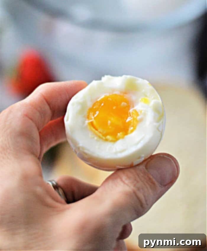 Perfectly cooked Soft-Boiled-Egg-in-Microwave with runny yolk.
