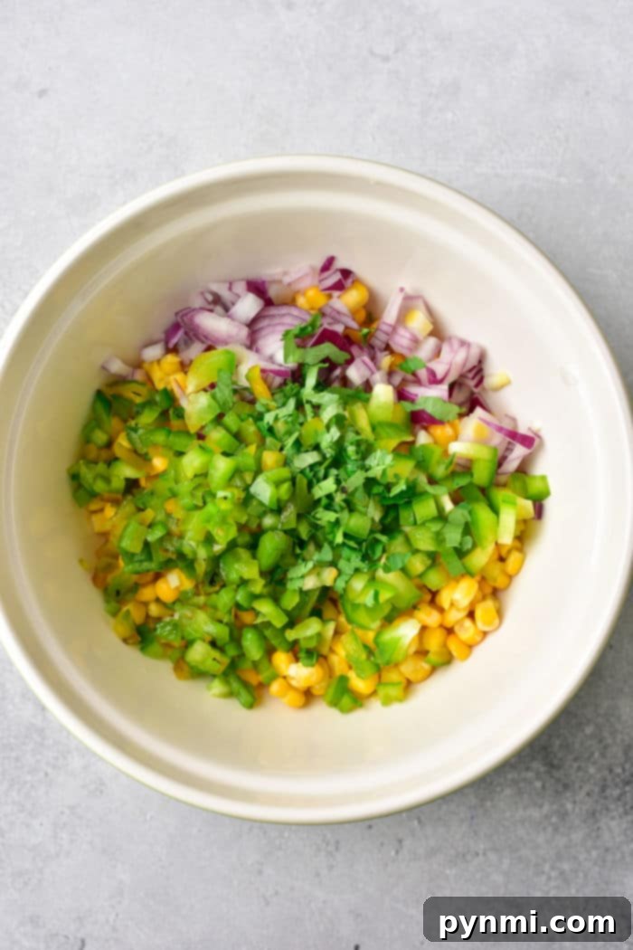 Homemade Chipotle Corn Salsa 4 A large bowl of homemade Copycat Chipotle Roasted Chili Corn Salsa