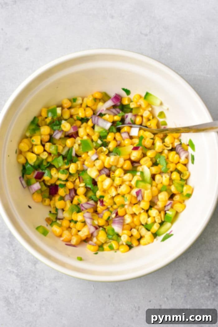Homemade Chipotle Corn Salsa 5 Vibrant Corn Salsa in a glass bowl, ready to serve