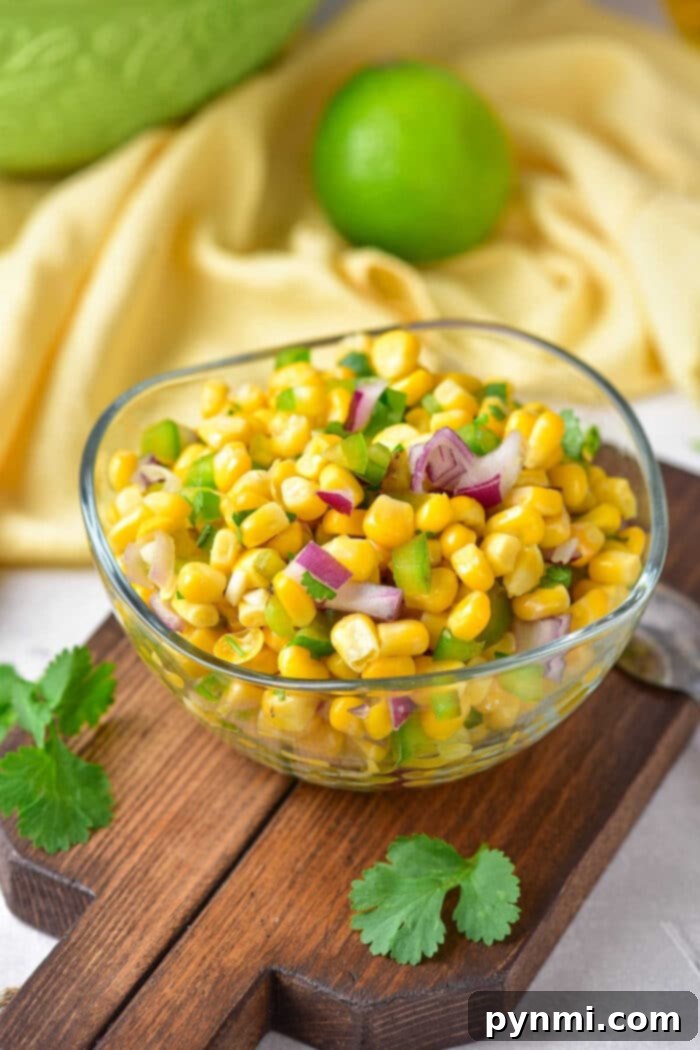 Homemade Chipotle Corn Salsa 6 Fresh Chipotle Corn Salsa in a clear bowl on a rustic background
