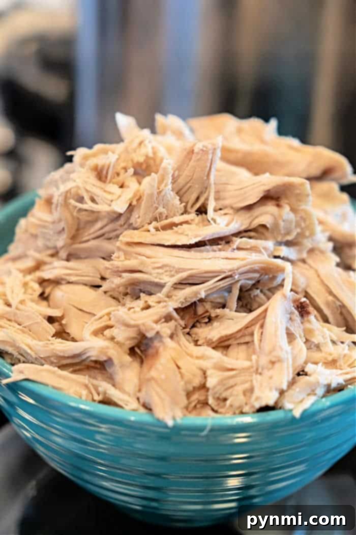 Succulent Bone-In Chicken Breast Recipes 5 shredded bone-in chicken breast in a bowl, ready for tacos or other dishes