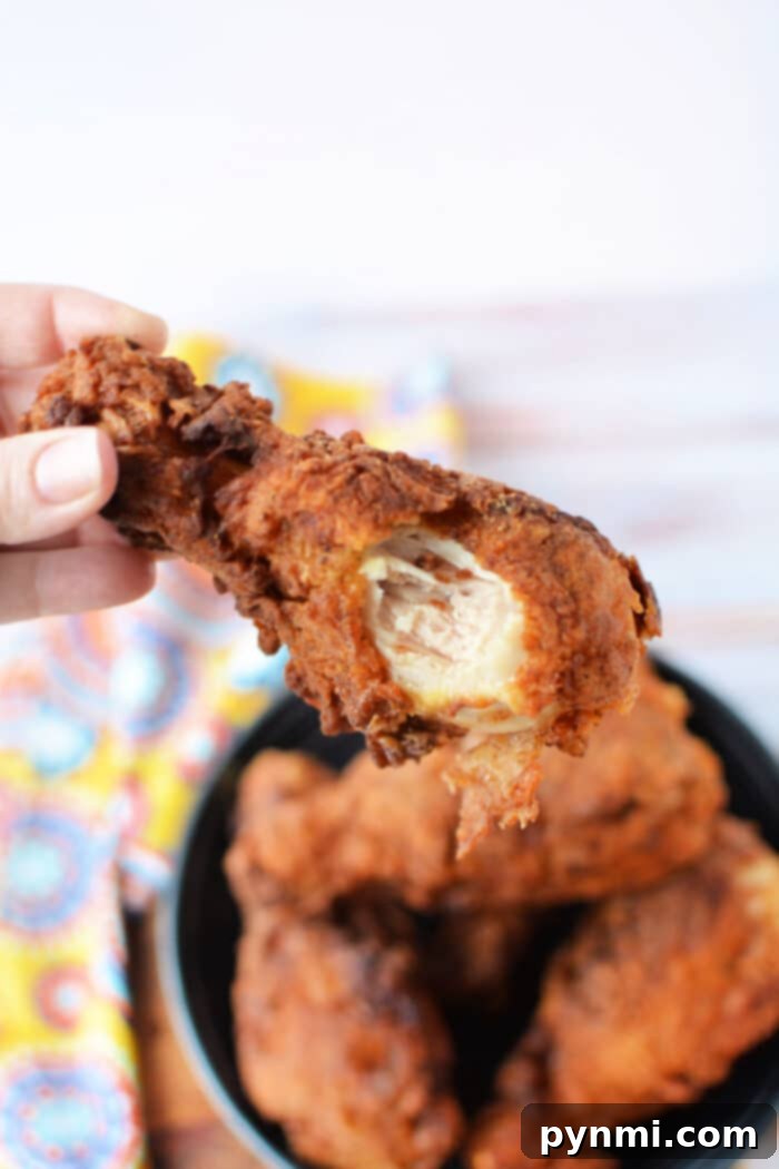 Crispy golden pan-fried chicken legs, ready to be served.