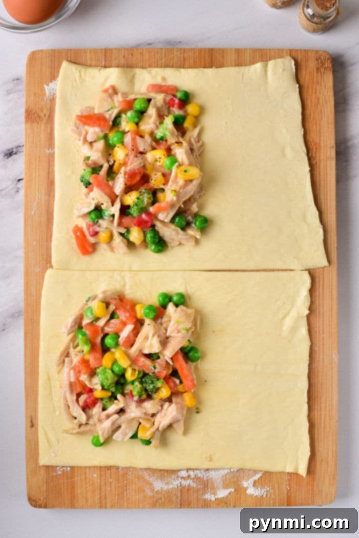 Preparing Meat Hand Pies, showing puff pastry being filled and folded for baking.