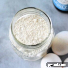 Cracker Barrel-Inspired Homemade Pancake Mix 8 A jar filled with homemade Cracker Barrel Pancake Mix, ready to be prepared for a delicious breakfast.
