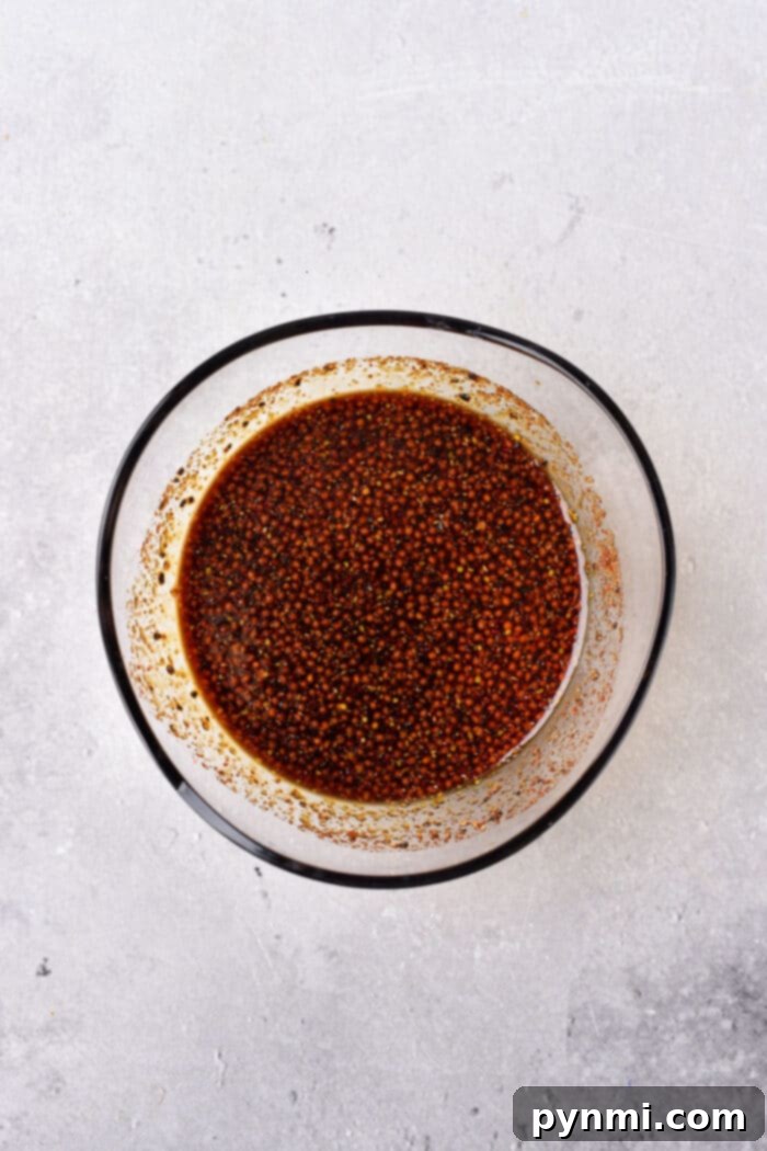 Stir Fry Marinade - Chicken in marinade in a glass bowl