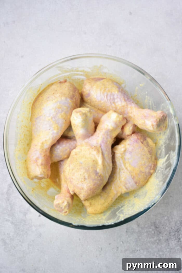 Crispy Air Fryer Curry Chicken 4 Marinated curry chicken drumsticks ready for cooking