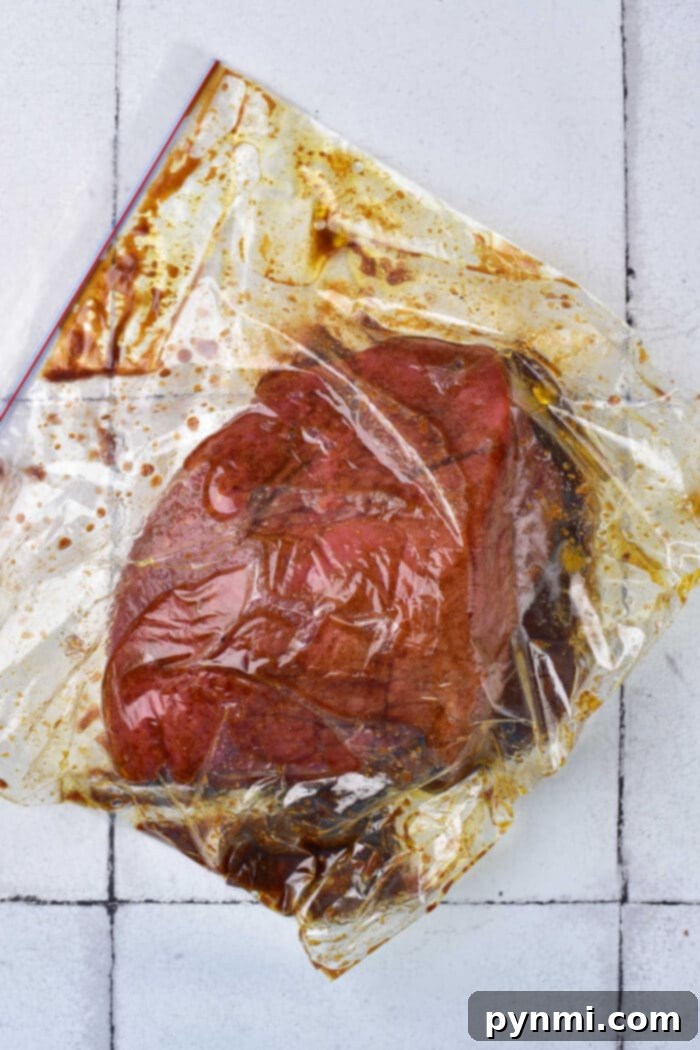 Marinated London Broil steak, ready to be cooked