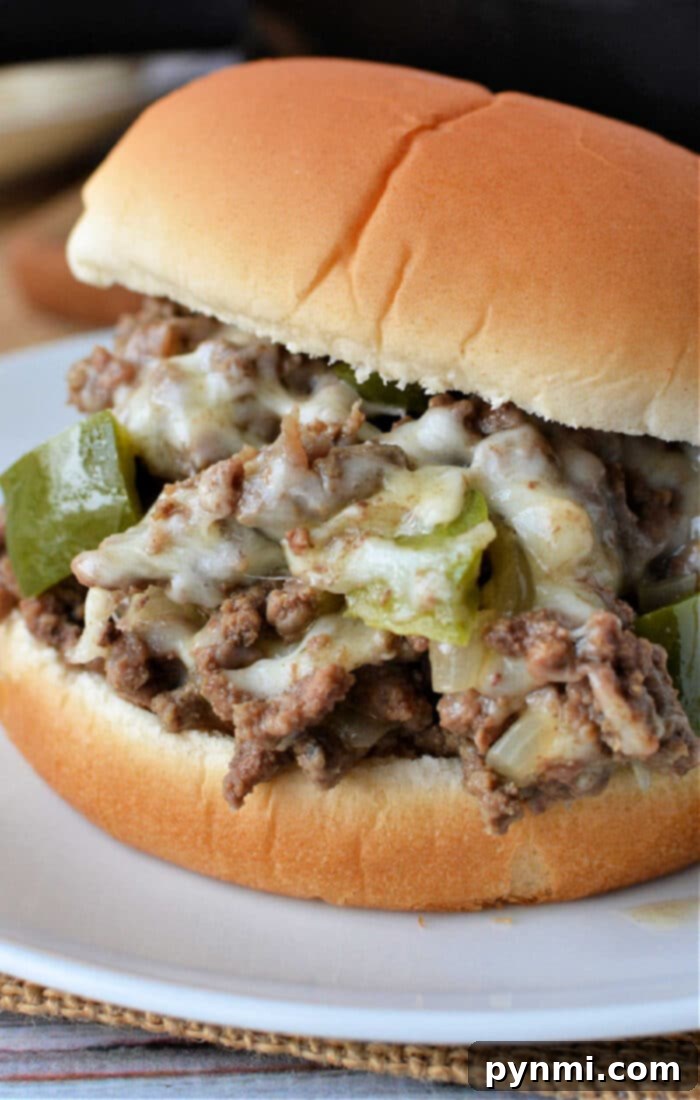 Philly Cheesesteak Sloppy Joes 2 Sloppy Joe Philly Cheesesteak sandwich, rich with ground beef, melted provolone cheese, and sautéed vegetables, served on a toasted bun.