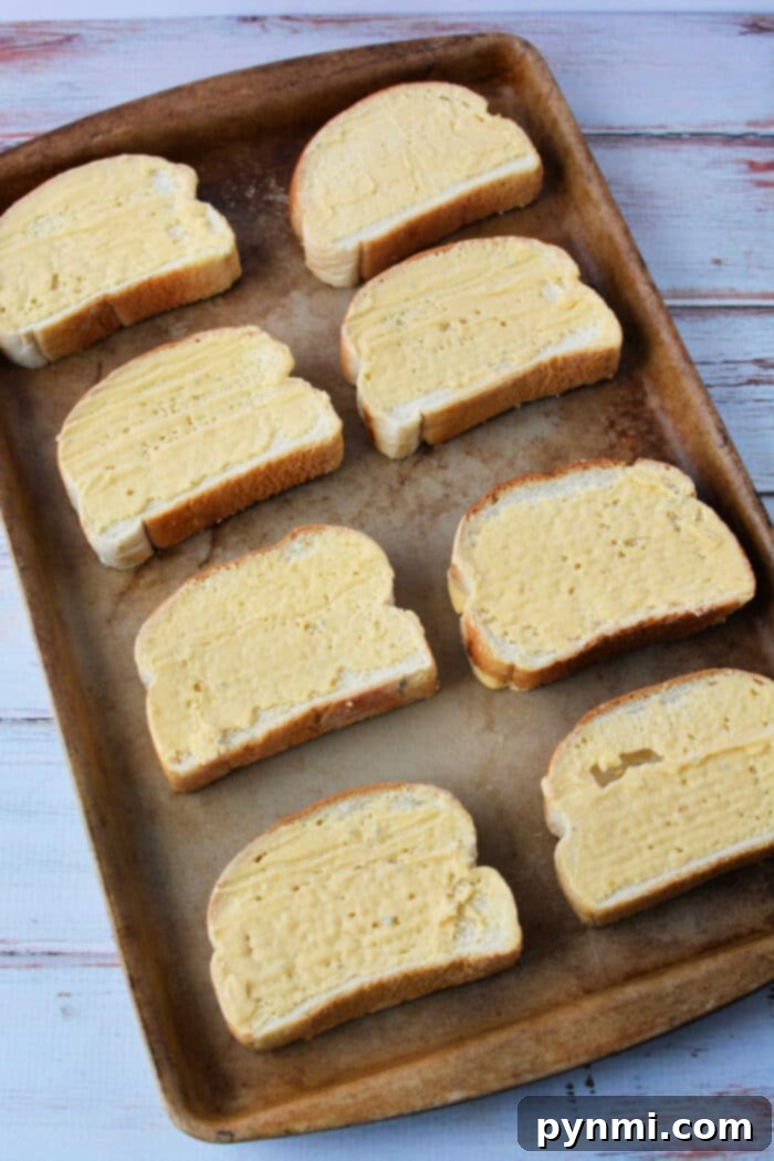 Ultimate Texas Toast Sloppy Joes 4 Texas Toast recipe with ingredients laid out on a baking sheet, ready for assembly.