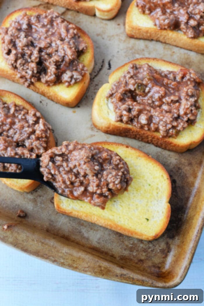 Ultimate Texas Toast Sloppy Joes 5 A close-up of a finished Texas Toast Sloppy Joe, ready to be served.