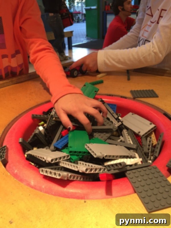Legoland Holiday Snowfest 10 Children building LEGO cars at the Legoland Creation Station.