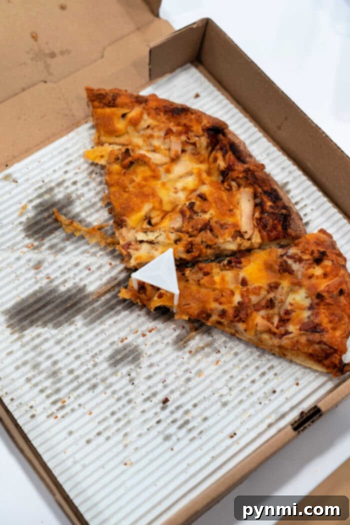 Crispy Pizza Revival: Toaster Oven Method 2 The best way to reheat pizza for a crispy crust and melted cheese