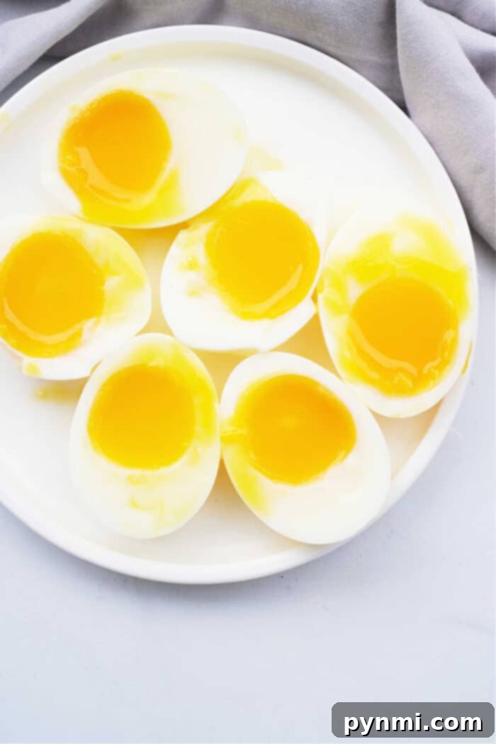 Perfect Soft Boiled Eggs Timing Guide 5 How Long to Cook Soft Boiled Eggs - A close-up of a perfectly soft-boiled egg, showing its creamy texture.