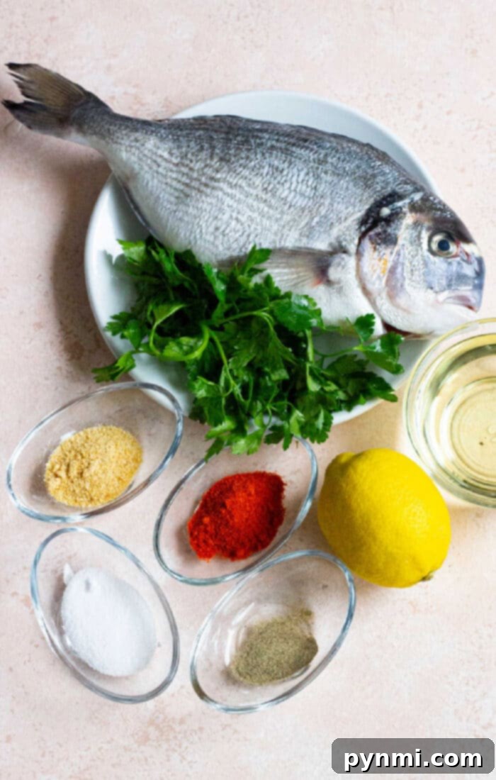 Assortment of whole fish suitable for deep frying, highlighting various textures and flavors.