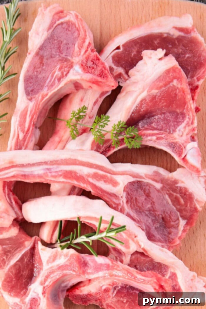 Assortment of Cooked Lamb Chops How Long to Cook Lamb Chops - Assortment of cooked lamb chops on a platter