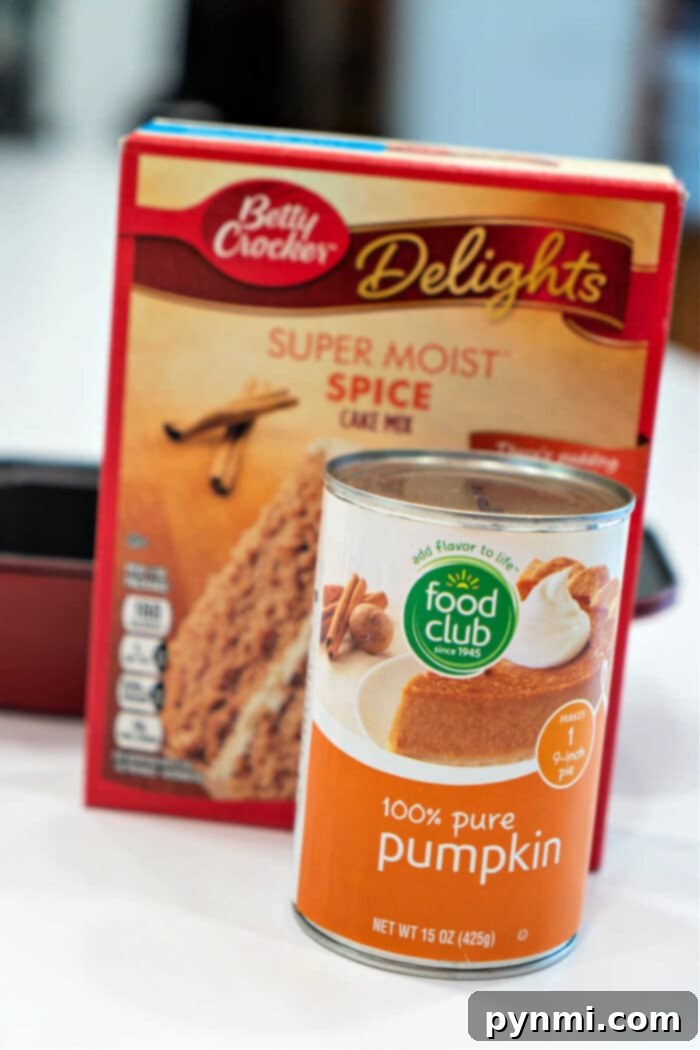 Warm, inviting slice of pumpkin bread with cake mix, highlighting its soft, moist texture.