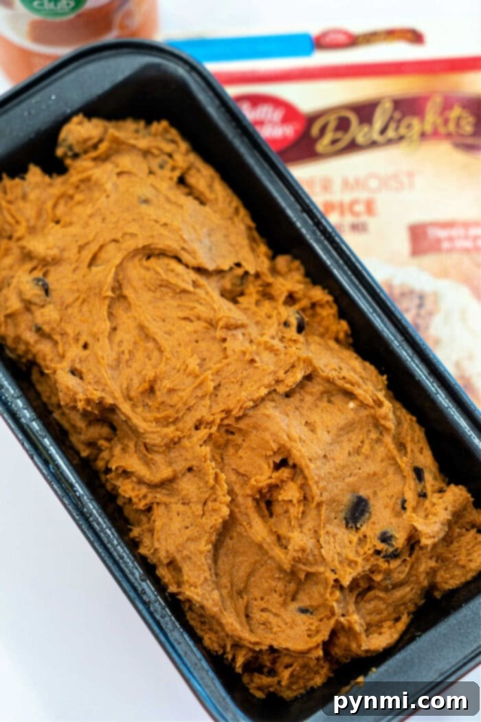 Freshly baked quick bread using spice cake mix, cooling on a wire rack.
