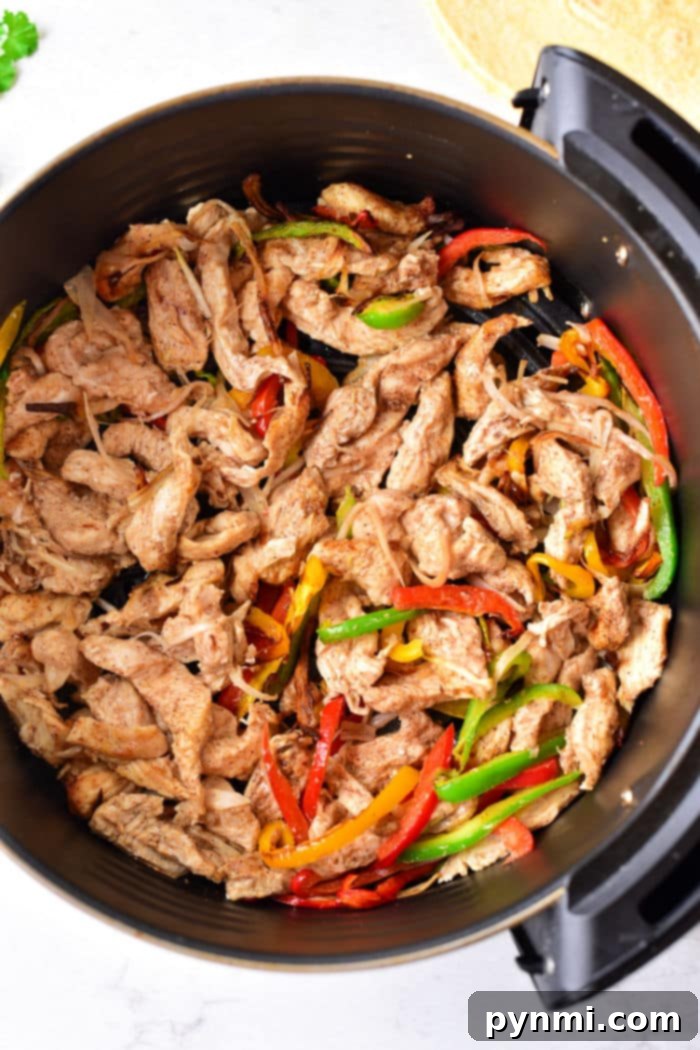 AirFryer Chicken Fajitas - Cooked chicken fajitas in an air fryer.