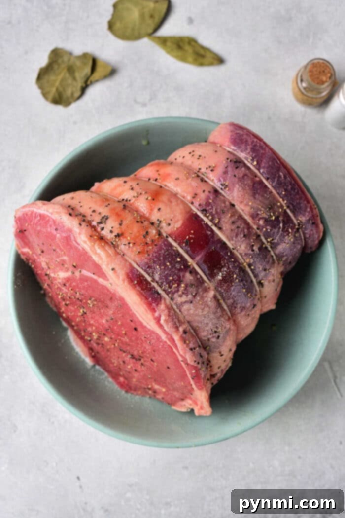Never Overcook Your Roast Again 3 A succulent beef shoulder roast, perfectly cooked and resting, ready to be carved or shredded for a hearty meal.