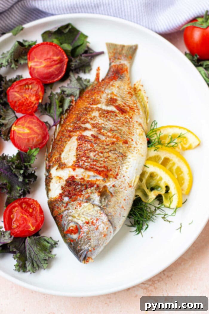 Air Fryer Whole Fish - beautifully seasoned and cooked to perfection in an air fryer basket