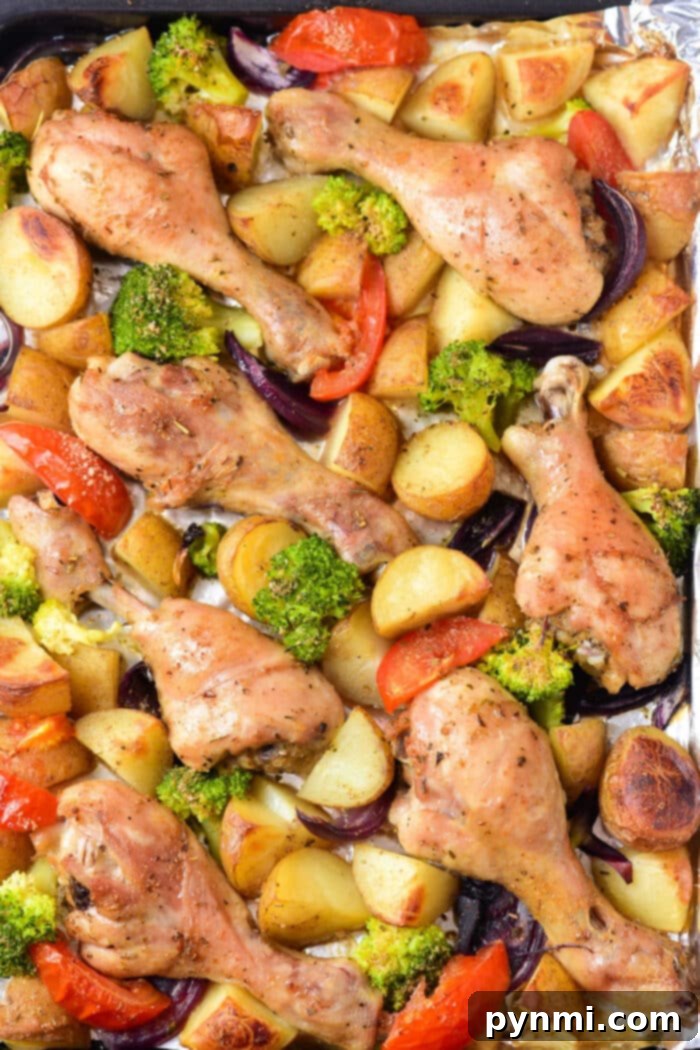 Melt-In-Your-Mouth Baked Chicken Drumsticks 5 Sheet Pan Drumsticks with a variety of vegetables