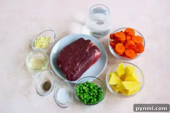 A raw piece of beef, reminiscent of bear meat in its robust appearance, rests on a plate surrounded by bowls of diced carrots, chopped potatoes, green peas, minced garlic, salt, pepper, oil, and a glass of water on a beige surface.