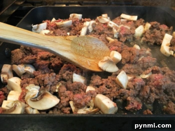 Easy stuffed peppers baking in a muffin tin