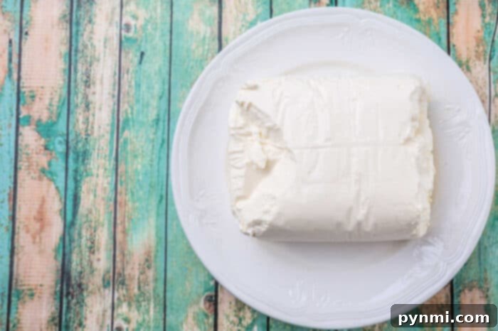 Close-up of creamy sauce with cream cheese in a slow cooker