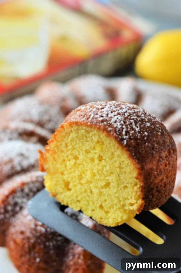 Duncan Hines Lemon Bundt Cake - A perfectly baked and glazed lemon bundt cake, showcasing its moist texture and vibrant color.