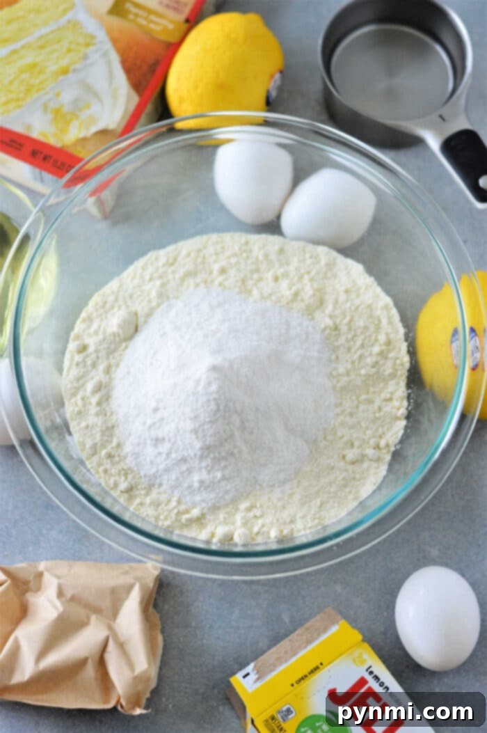 Lemon Cake with Pudding - A delicious lemon cake baked with pudding mix, ready to be glazed or topped.