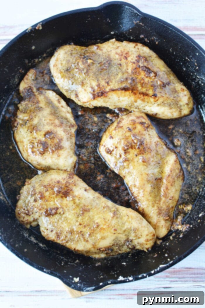Garlic Butter Chicken Breast - close up of sliced chicken breast
