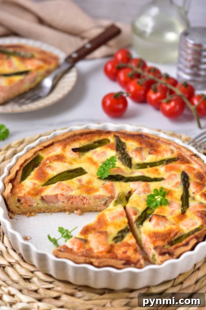 Flaky Quiche Foundation 7 Finished quiche with a golden, homemade crust, garnished and ready to serve