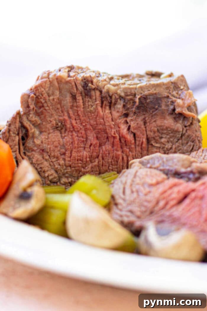 Perfectly cooked Cross Rib Roast, ready to be carved.