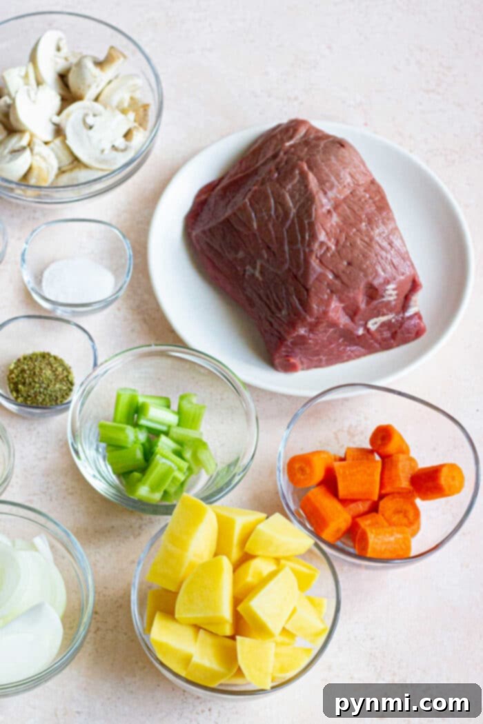 A whole Cross Rib Roast, ready for the oven, covered in seasoning.