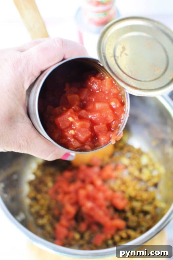 One Pot Chicken Curry Delight 4 Instant Pot Chicken Curry simmering, showing the rich sauce.